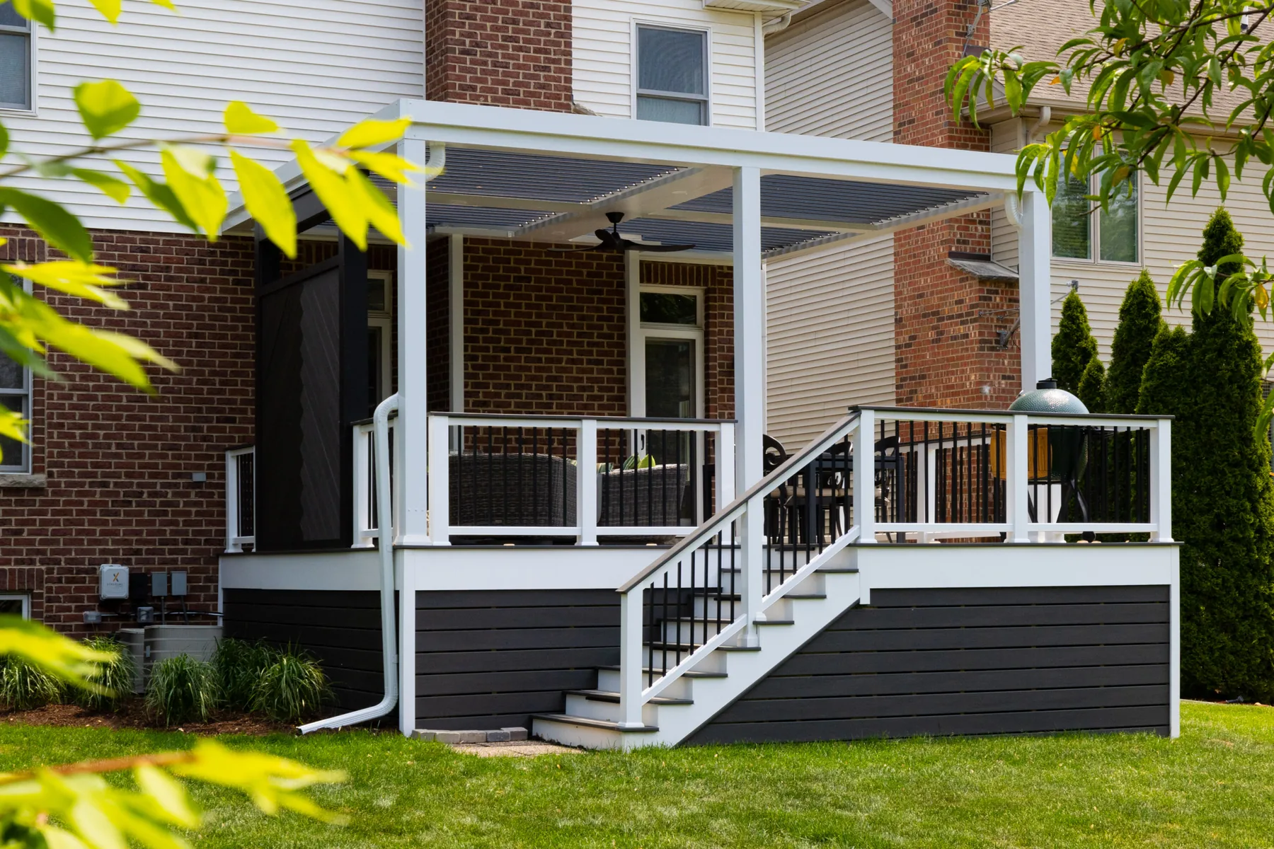 Residential pergola with stairs and garden deck