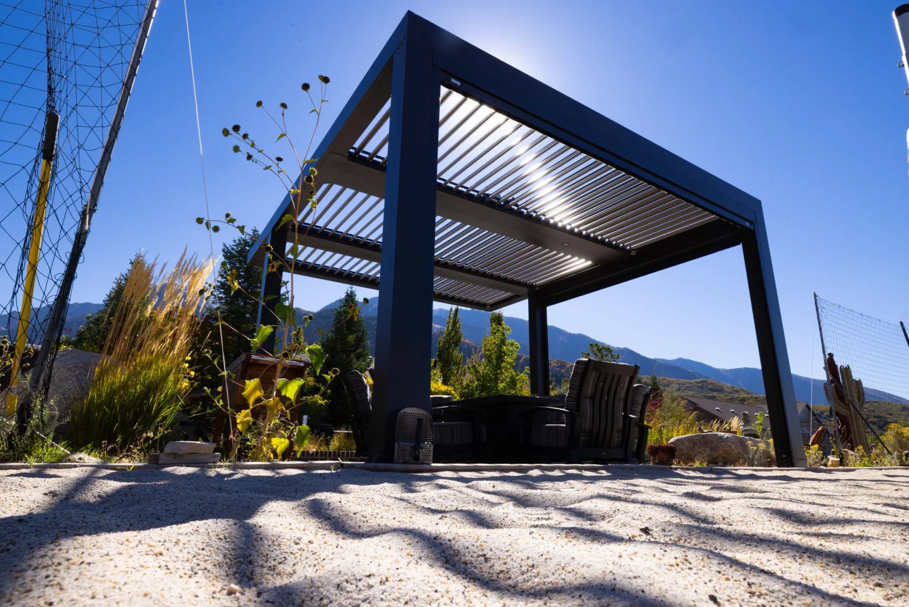 Modern freestanding pergola in landscape setting